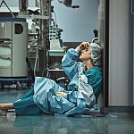 Woman surgeon looking sadness fatigue after surgery copyspace stress depression guilt unhappy problem worker medicine healthcare emotions