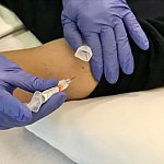 Image of a person getting a shot
