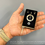 Hand holding the iLet bionic pancreas device