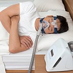 Image of a man wearing a CPAP machine while sleeping