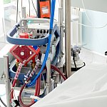 An ECMO (extracorporeal membrane oxygenation) machine in a patient’s hospital room