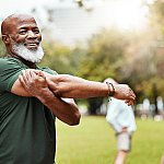 Portrait, stretching and active seniors at a park for training, exercise and cardio wellness. Fitness, arm stretch and friends with senior men relax before workout, happy and together for activity 