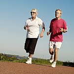 a photo of a man and a woman jogging