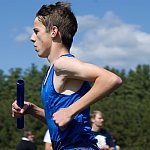 photo of a teenage boy running