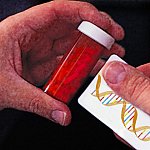 Photo of hands holding a medicine vial and a DNA label