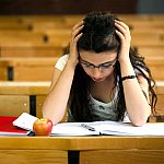 Photo of a young woman studying