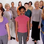 Large group of women standing side by side.