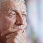 Portrait of an older man deep in thought