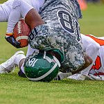 High school football player landing on his head