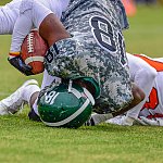 High school football player landing on his head
