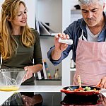 Man adding a pinch of salt to a pan of vegetables while woman whisks eggs.