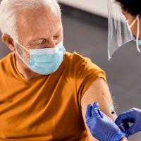 Man getting a vaccine.
