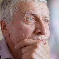 Portrait of an older man deep in thought