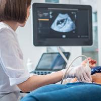 Pregnant woman on utltrasonographic examination at hospital 