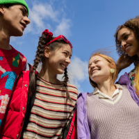 a group of smiling teens
