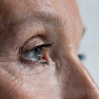 A close-up of an older woman's eye.