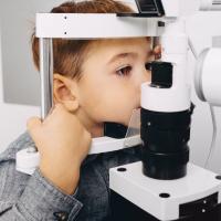 Image of a child receiving an eye exam.