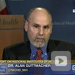 video screenshot of Dr. Alan Guttmacher.